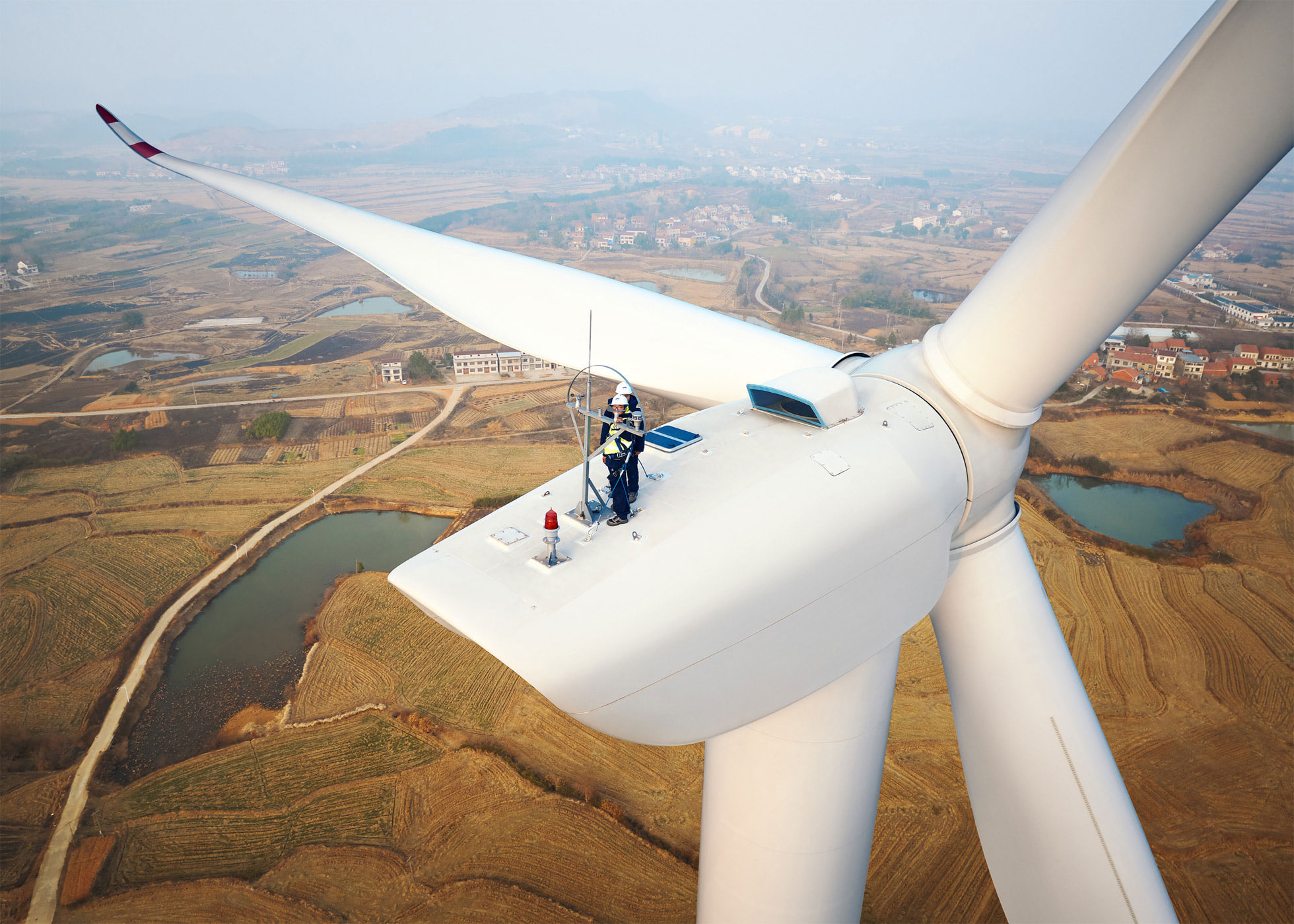 https://www.macfreak.nl/modules/news/images/zArt.AppleRenewableEnergyWindmillWuhan.jpg